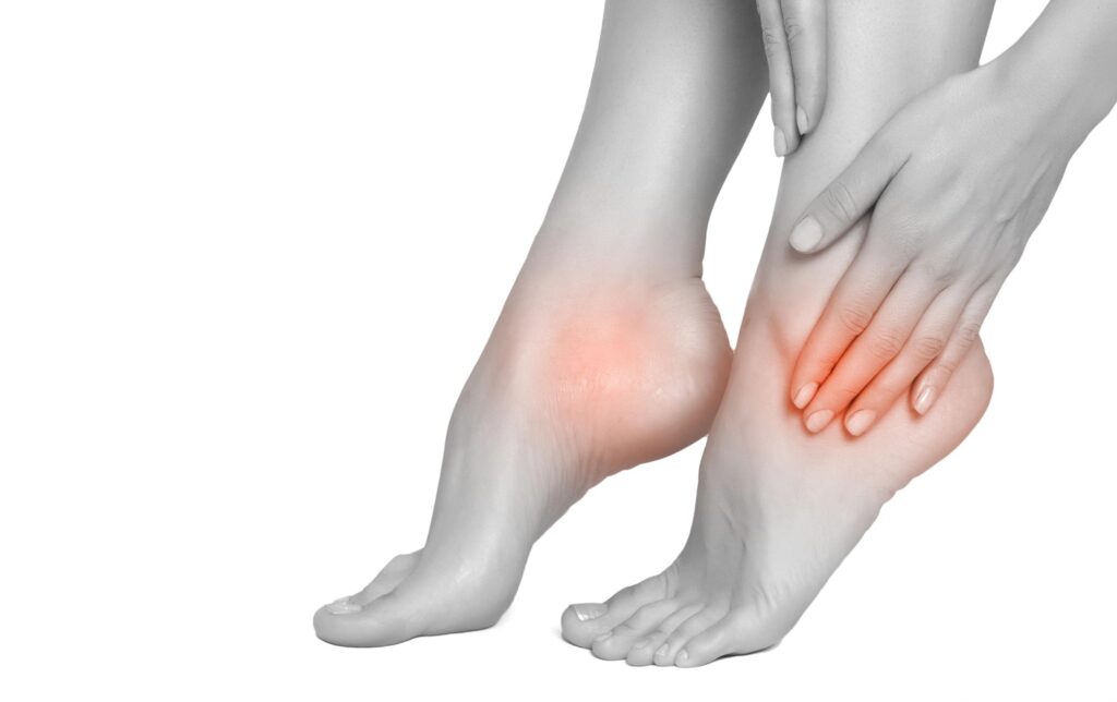 A painful ankle is highlighted in this image, demonstrating the need for foot & ankle urgent care in Houston.