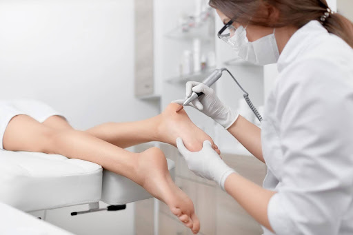 Wharton’s Jelly podiatrist in Houston examining patient for regenerative treatment