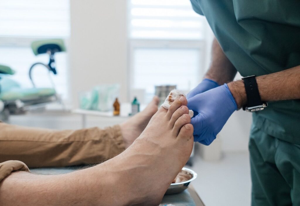 Licensed Podiatrist Ingrown Toenail Cypress clinic applying a sterile bandage after a successful nail treatment.
