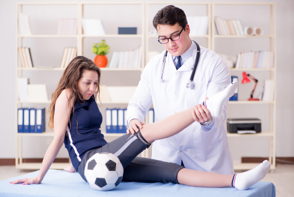 Female athlete at Foot and Ankle Doctor Cypress for sports injury rehabilitation and physical therapy exam.