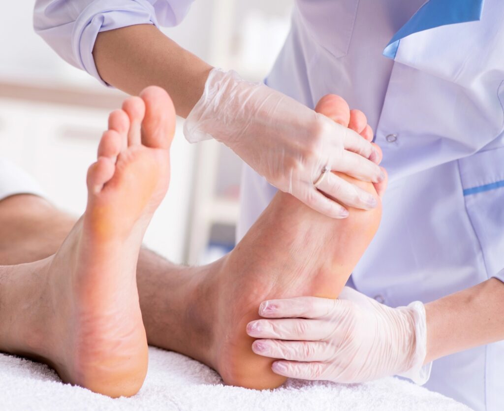 Specialist Amerigroup podiatrist Cypress TX performing a comprehensive foot examination and patient consultation.