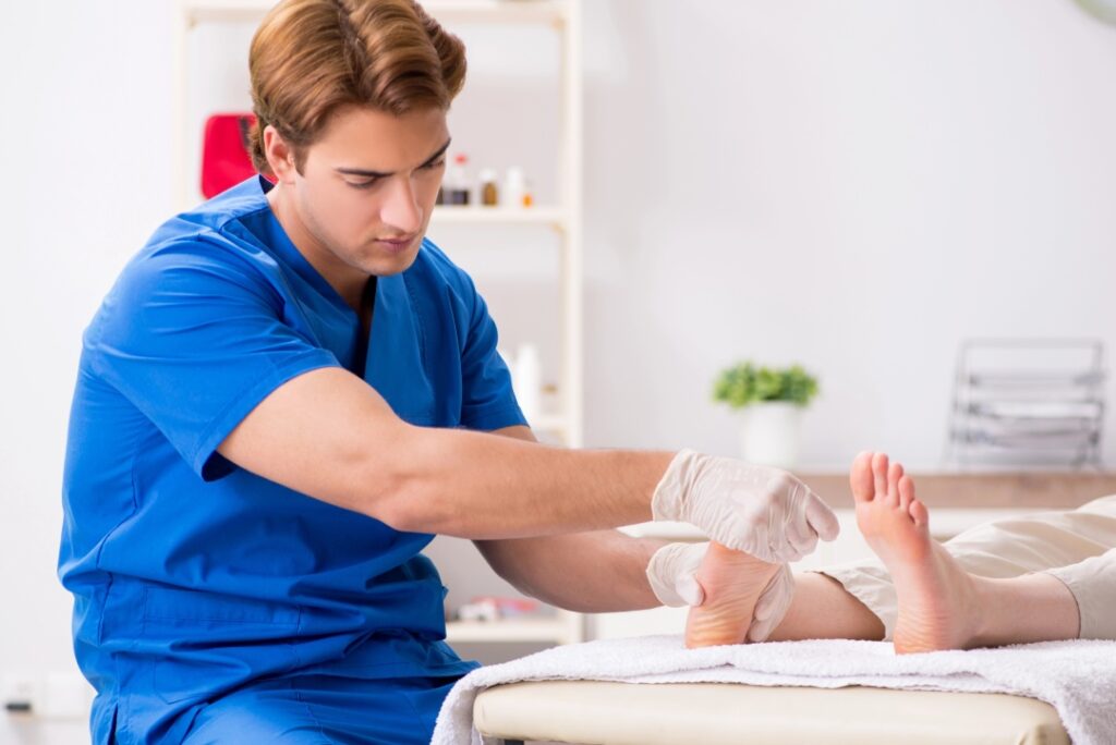 A Superior HealthPlan podiatrist Cypress professional performs a detailed clinical foot exam on a patient in-office.
